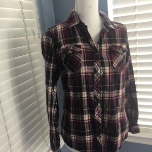 Purple plaid flannel shirt gently worn. Size S.